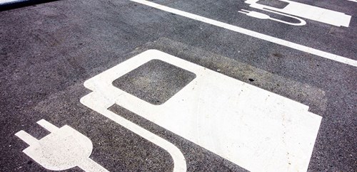 EV charging icon painted onto a parking bay